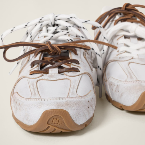New Balance (WMNS) x Miu Miu 530 SL Sneakers in White Leather