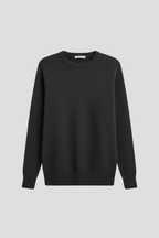 Women’s knitted sweater with round neckline and ribbed hem
