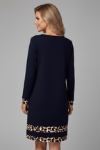 Women’s short dress with round neckline and long sleeves